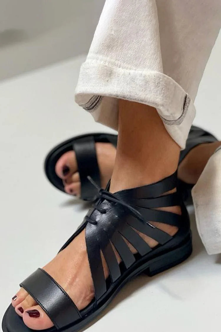 Sandalias negras de tacón hueco con punta redonda de color liso