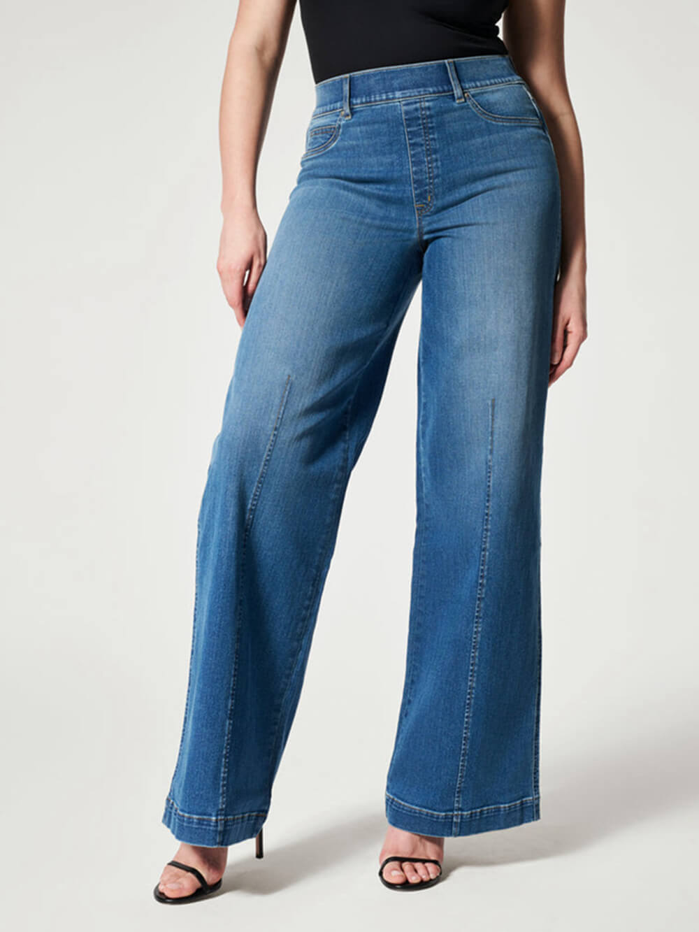 Jeans a vita media a gamba larga