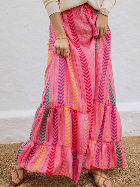 Maxi-rok met grote zwier, hoge taille, koord en chevronpatroon